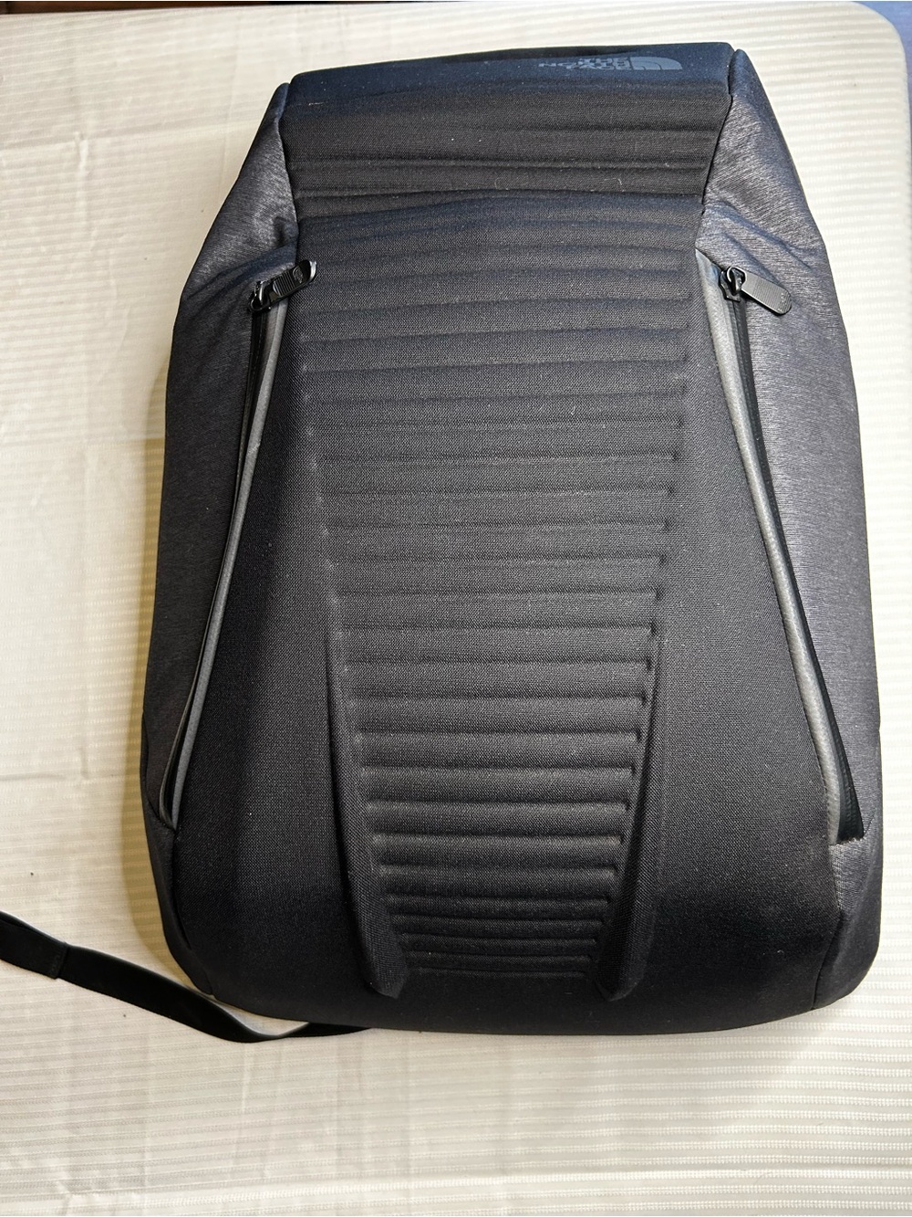 These North Face Men's/ Women’s Black Tech Backpack. EC. Peach color lining
